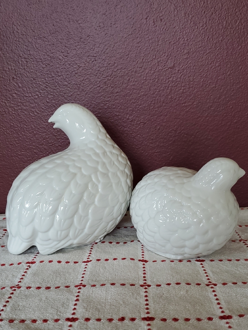 Pair of white ceramic quails